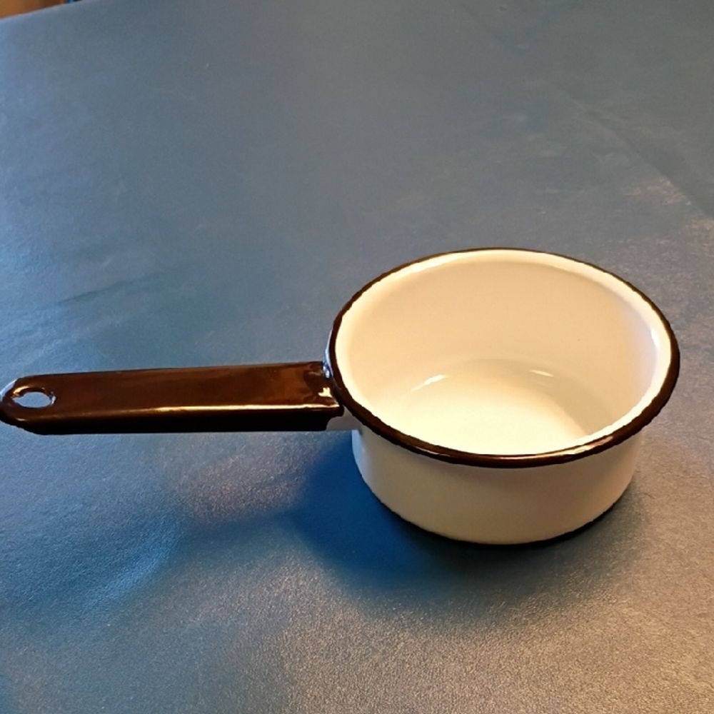White Enamelware Saucepan with Black Handle